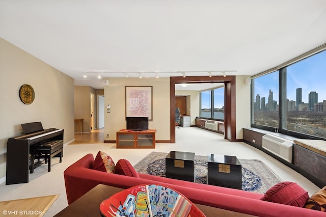 155 N Harbor Dr Unit 1103, Chicago, IL 60601 - carpeted living room with rail lighting, a wall mounted air conditioner, and baseboards