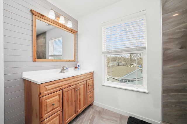 6010 Peart Rd, Morris, IL 60450 - bathroom with vanity, wood walls, baseboards, and marble finish floors
