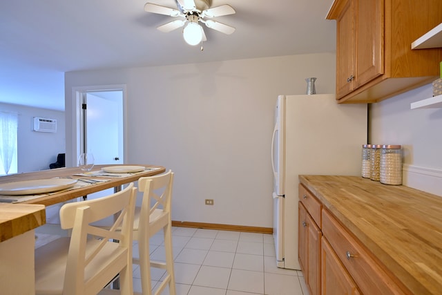 5816 N Nagle Ave Unit B, Chicago, IL 60646 - dining area featuring ceiling fan, light tile patterned floors, and a wall mounted air conditioner