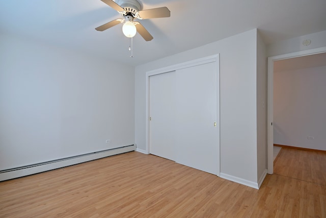5816 N Nagle Ave Unit B, Chicago, IL 60646 - unfurnished bedroom featuring light wood-style floors, a closet, baseboards, a ceiling fan, and a baseboard radiator
