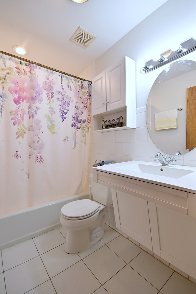 5816 N Nagle Ave Unit B, Chicago, IL 60646 - full bathroom featuring toilet, vanity, shower / bath combo with shower curtain, tile patterned floors, and tile walls