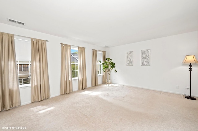 707 Morris Ct, Lakemoor, IL 60051 - carpeted empty room featuring baseboards
