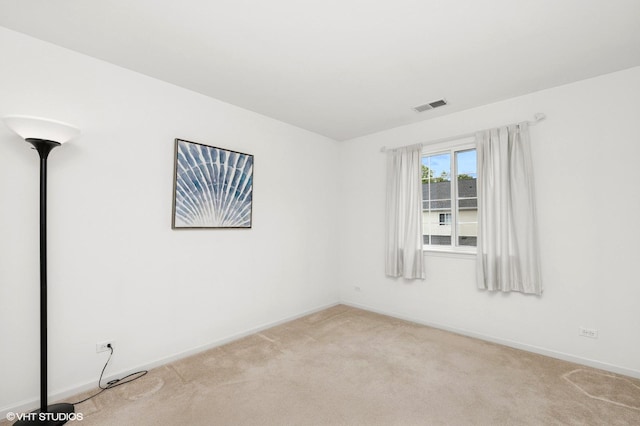 707 Morris Ct, Lakemoor, IL 60051 - spare room with light carpet and baseboards