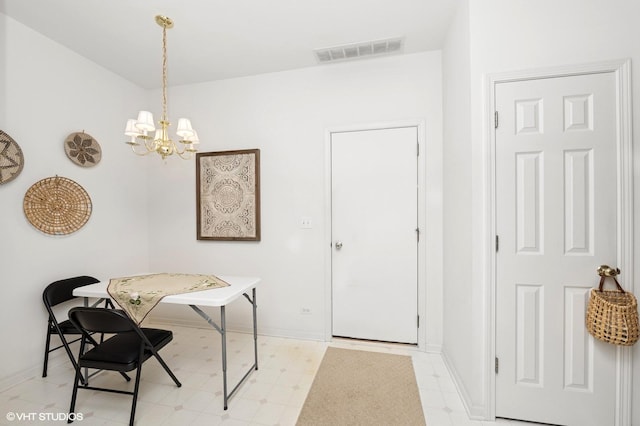 707 Morris Ct, Lakemoor, IL 60051 - dining area with a chandelier and baseboards