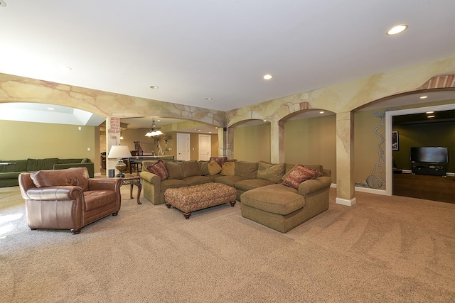 26285 W Roberts Ln, Barrington, IL 60010 - living room featuring ornate columns, arched walkways, carpet floors, and recessed lighting
