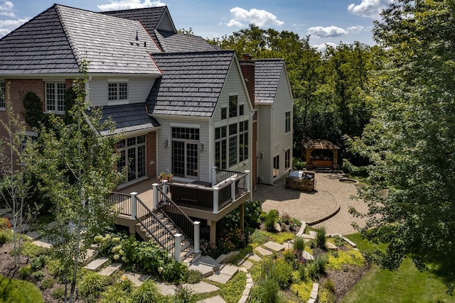 26285 W Roberts Ln, Barrington, IL 60010 - rear view of house featuring a wooden deck, a gazebo, a chimney, stairs, and a jacuzzi