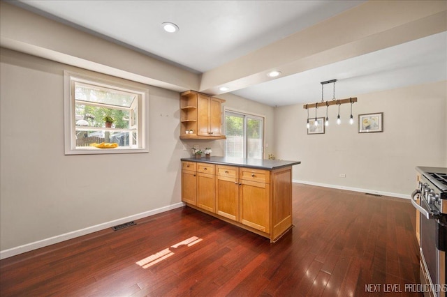 6416 W Rawson Bridge Rd W, Cary, IL 60013 - kitchen featuring a peninsula, high end range, dark countertops, baseboards, and recessed lighting