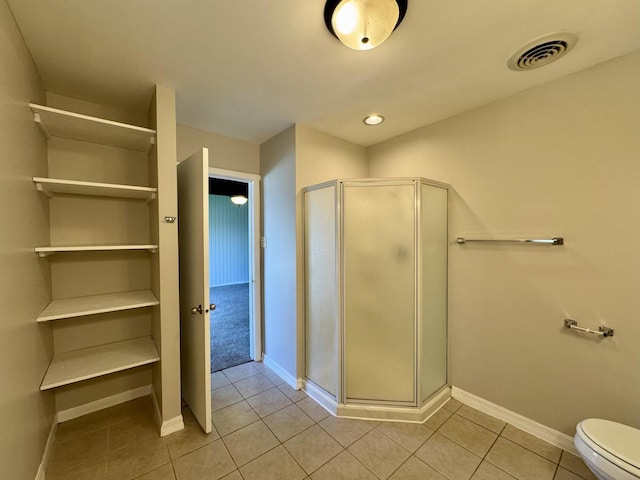 16159 Long Ave, Oak Forest, IL 60452 - bathroom featuring tile patterned flooring, a stall shower, and baseboards