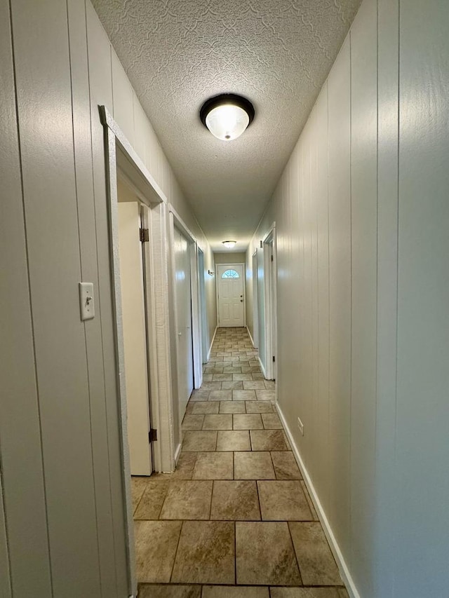 16159 Long Ave, Oak Forest, IL 60452 - corridor featuring a textured ceiling and baseboards
