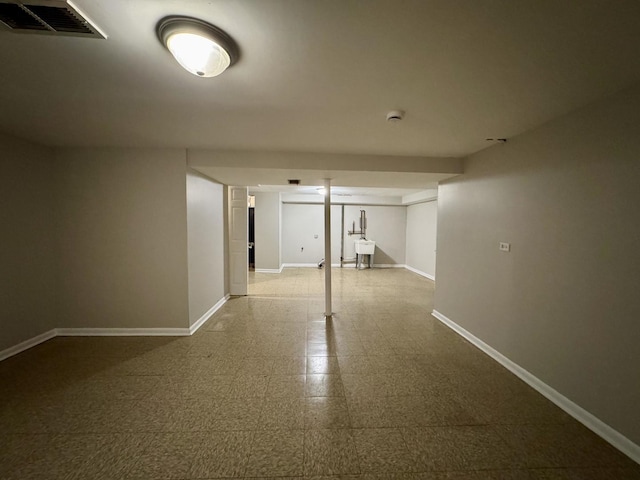 16159 Long Ave, Oak Forest, IL 60452 - spare room with baseboards, tile patterned floors, a sink, and a smoke detector
