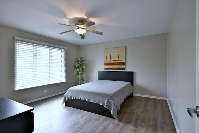 179 Old Forge Rd, Elgin, IL 60123 - bedroom with baseboards, wood finished floors, and a ceiling fan