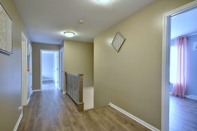 179 Old Forge Rd, Elgin, IL 60123 - corridor with an upstairs landing, wood finished floors, and baseboards