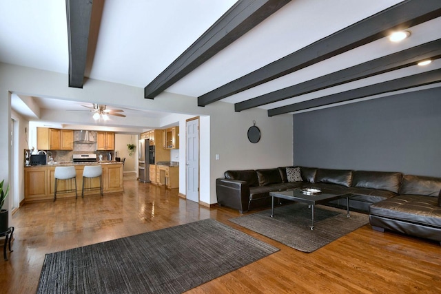 179 Old Forge Rd, Elgin, IL 60123 - living area with wood finished floors, beamed ceiling, and ceiling fan