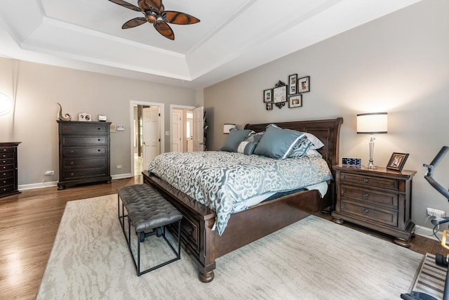 41W877 Hunters Rdg, Saint Charles, IL 60175 - bedroom featuring a tray ceiling, wood finished floors, and a ceiling fan