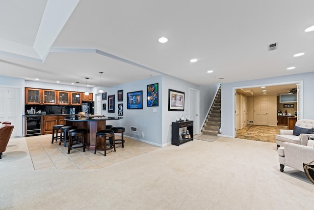 41W877 Hunters Rdg, Saint Charles, IL 60175 - dining area featuring wet bar, light colored carpet, recessed lighting, stairway, and wine cooler