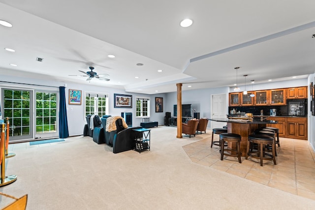 41W877 Hunters Rdg, Saint Charles, IL 60175 - living area with light carpet, recessed lighting, ceiling fan, healthy amount of natural light, and bar area