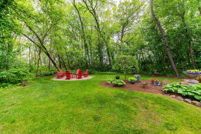 41W877 Hunters Rdg, Saint Charles, IL 60175 - view of grassy yard with an outdoor fire pit
