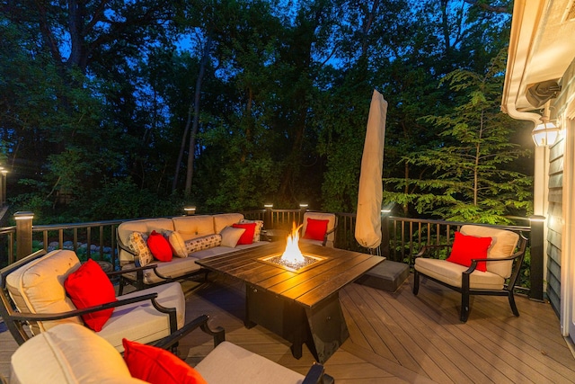 41W877 Hunters Rdg, Saint Charles, IL 60175 - deck at twilight featuring an outdoor living space with a fire pit
