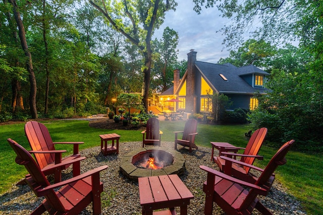 41W877 Hunters Rdg, Saint Charles, IL 60175 - view of green lawn featuring a fire pit and a patio area