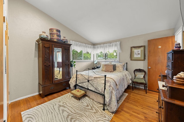 22W300 Arbor Ln, Glen Ellyn, IL 60137 - bedroom featuring lofted ceiling and light wood-type flooring