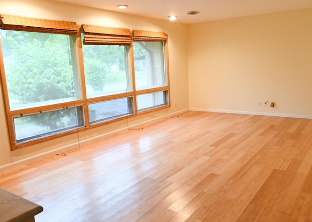 17315 Bryant Ln, Hazel Crest, IL 60429 - spare room with wood finished floors, baseboards, and recessed lighting