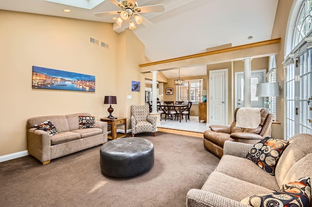 807 S Saylor Ave, Elmhurst, IL 60126 - carpeted living room with ornate columns, baseboards, a ceiling fan, high vaulted ceiling, and recessed lighting