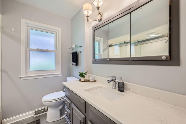 807 S Saylor Ave, Elmhurst, IL 60126 - full bathroom with toilet, vanity, a shower, and baseboards