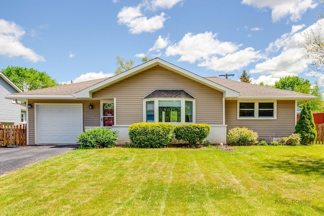 2422 E Grand Ave, Lindenhurst, IL 60046 - ranch-style home featuring a garage, asphalt driveway, brick siding, and roof with shingles