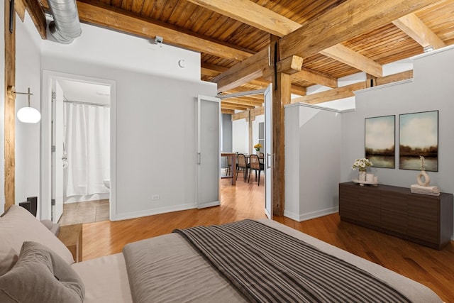 3201 N Ravenswood Ave Unit 203, Chicago, IL 60657 - bedroom with wooden ceiling with exposed beams, wood finished floors, and baseboards