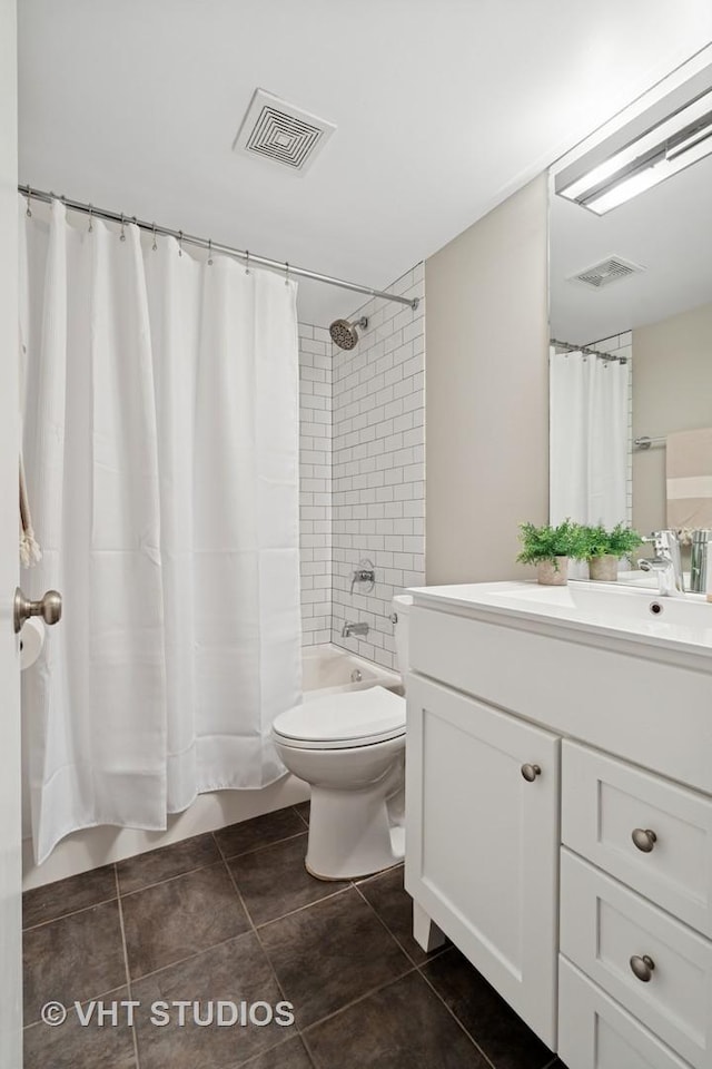3201 N Ravenswood Ave Unit 203, Chicago, IL 60657 - full bathroom featuring vanity, toilet, shower / bathtub combination with curtain, and tile patterned floors