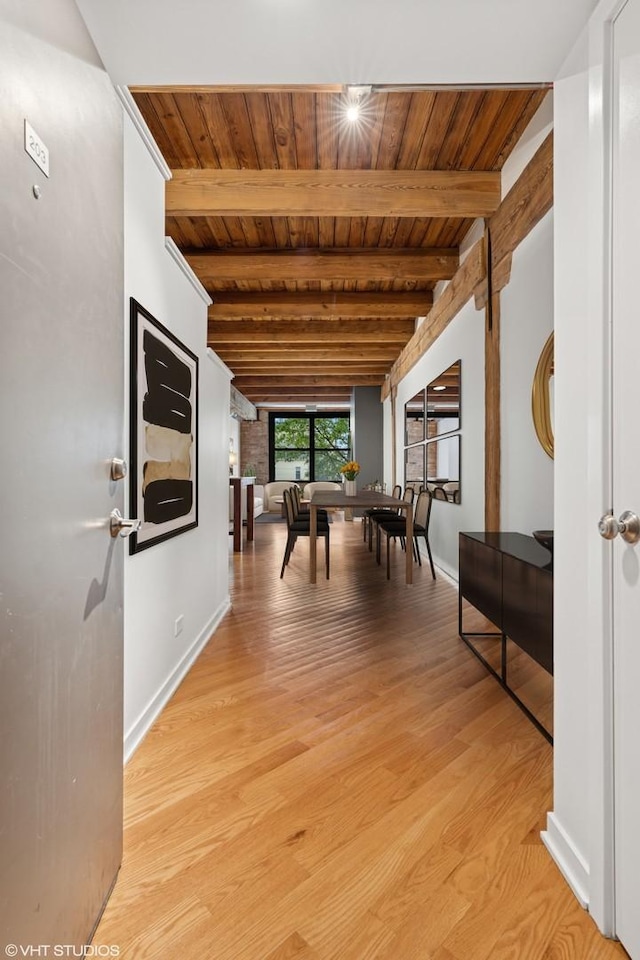 3201 N Ravenswood Ave Unit 203, Chicago, IL 60657 - hall with wood ceiling with exposed beams, baseboards, and light wood-style flooring