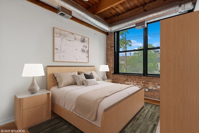 3201 N Ravenswood Ave Unit 203, Chicago, IL 60657 - bedroom with wooden ceiling with exposed beams, brick wall, dark wood-type flooring, and baseboards