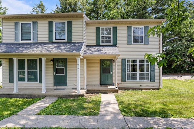 610 English Creek Ct Unit B, Champaign, IL 61821 - view of property with covered porch and a front yard