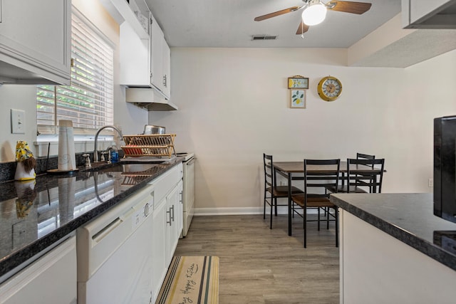 610 English Creek Ct Unit B, Champaign, IL 61821 - kitchen featuring white dishwasher, a ceiling fan, white cabinets, light wood-style floors, and dark stone counters