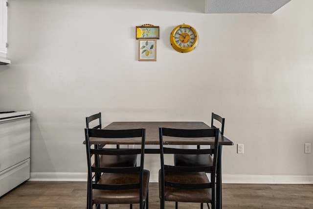 610 English Creek Ct Unit B, Champaign, IL 61821 - dining space featuring dark wood-style flooring