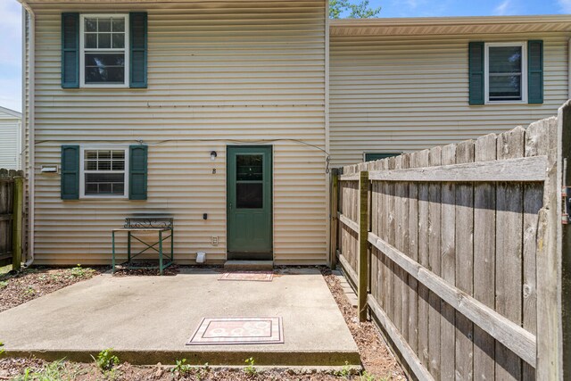 610 English Creek Ct Unit B, Champaign, IL 61821 - back of house with a patio area