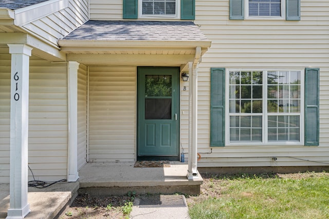 610 English Creek Ct Unit B, Champaign, IL 61821 - property entrance with a shingled roof