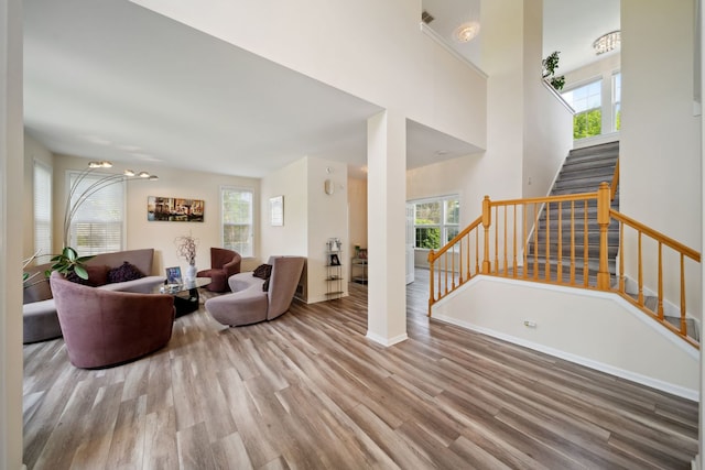 2205 Miramar Ct, Buffalo Grove, IL 60089 - living room with wood finished floors, healthy amount of natural light, and stairs