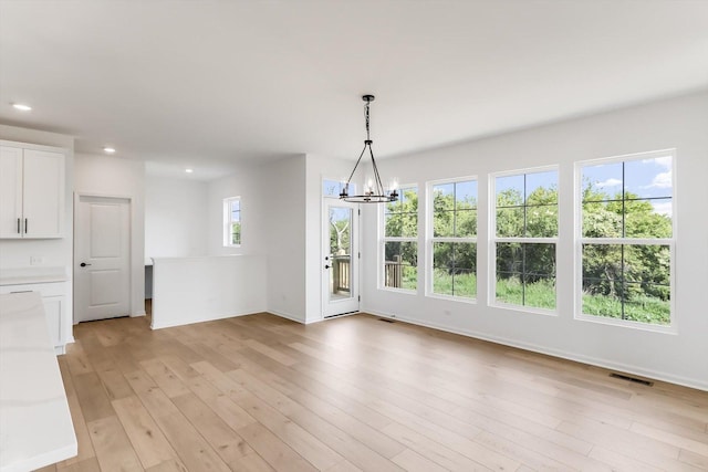 28 Open Pkwy, Hawthorn Woods, IL 60047 - unfurnished dining area with a chandelier, recessed lighting, baseboards, and light wood-type flooring
