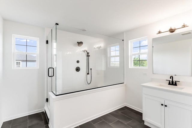 28 Open Pkwy, Hawthorn Woods, IL 60047 - bathroom with a tile shower, vanity, baseboards, and tile patterned floors