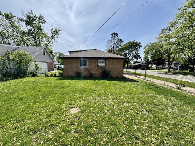 14401 Kolin Ave, Midlothian, IL 60445 - view of side of home with brick siding