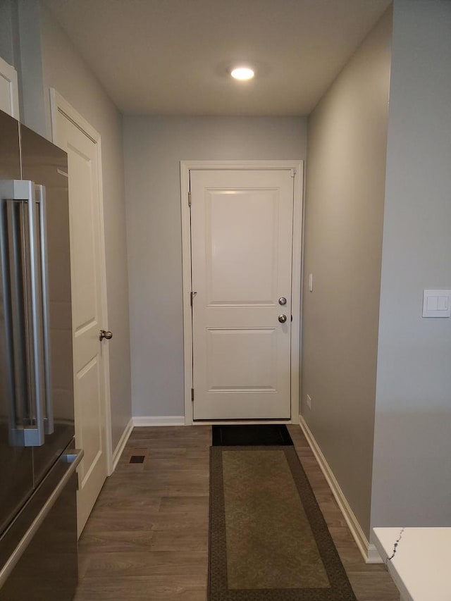 754 Westbury Dr, Cary, IL 60013 - doorway featuring dark wood-style flooring and recessed lighting