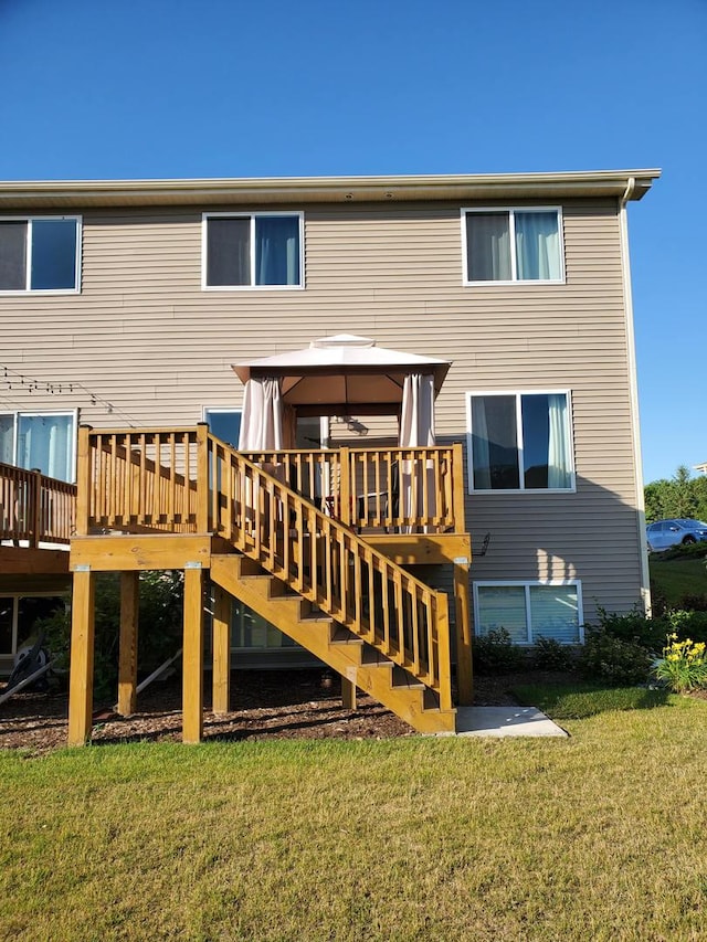 754 Westbury Dr, Cary, IL 60013 - back of property featuring a gazebo, a lawn, a wooden deck, and stairway