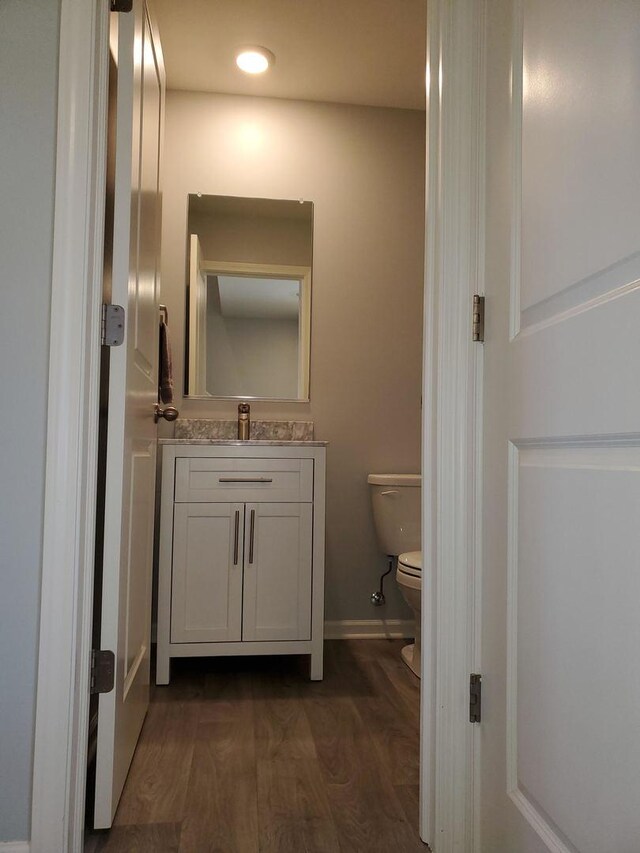 754 Westbury Dr, Cary, IL 60013 - half bathroom featuring vanity and wood finished floors