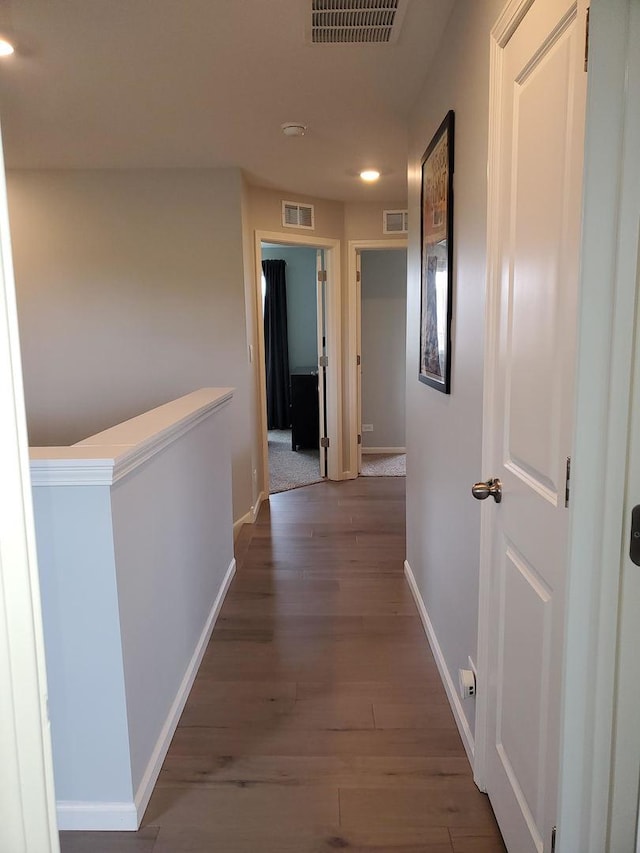 754 Westbury Dr, Cary, IL 60013 - hall featuring recessed lighting, wood finished floors, and an upstairs landing