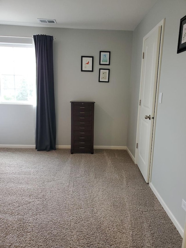 754 Westbury Dr, Cary, IL 60013 - unfurnished room featuring carpet floors and baseboards