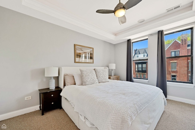 4606 S Lake Park Ave Unit 201N, Chicago, IL 60653 - bedroom featuring light colored carpet, a raised ceiling, baseboards, ornamental molding, and ceiling fan