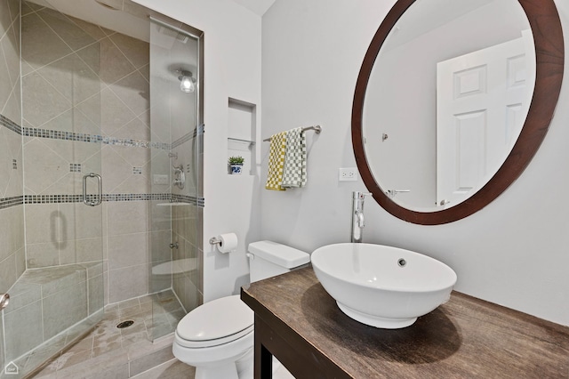 4606 S Lake Park Ave Unit 201N, Chicago, IL 60653 - full bath with a stall shower, toilet, and vanity