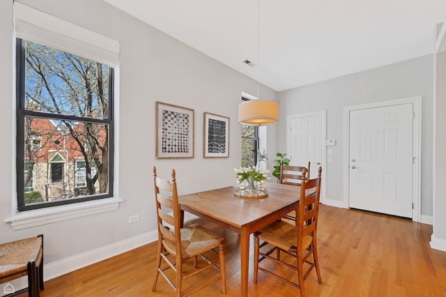 4606 S Lake Park Ave Unit 201N, Chicago, IL 60653 - dining area with light wood-style flooring and baseboards