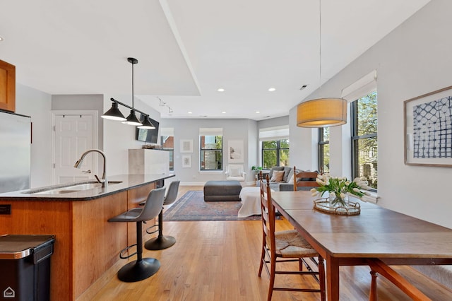4606 S Lake Park Ave Unit 201N, Chicago, IL 60653 - dining room with light wood-style floors and baseboards